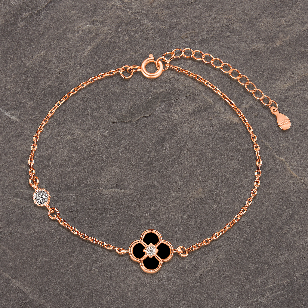 THE RICH CO - STERLING SILVER 18KT ROSE GOLD PLATED BLACK CLOVER BRACELET