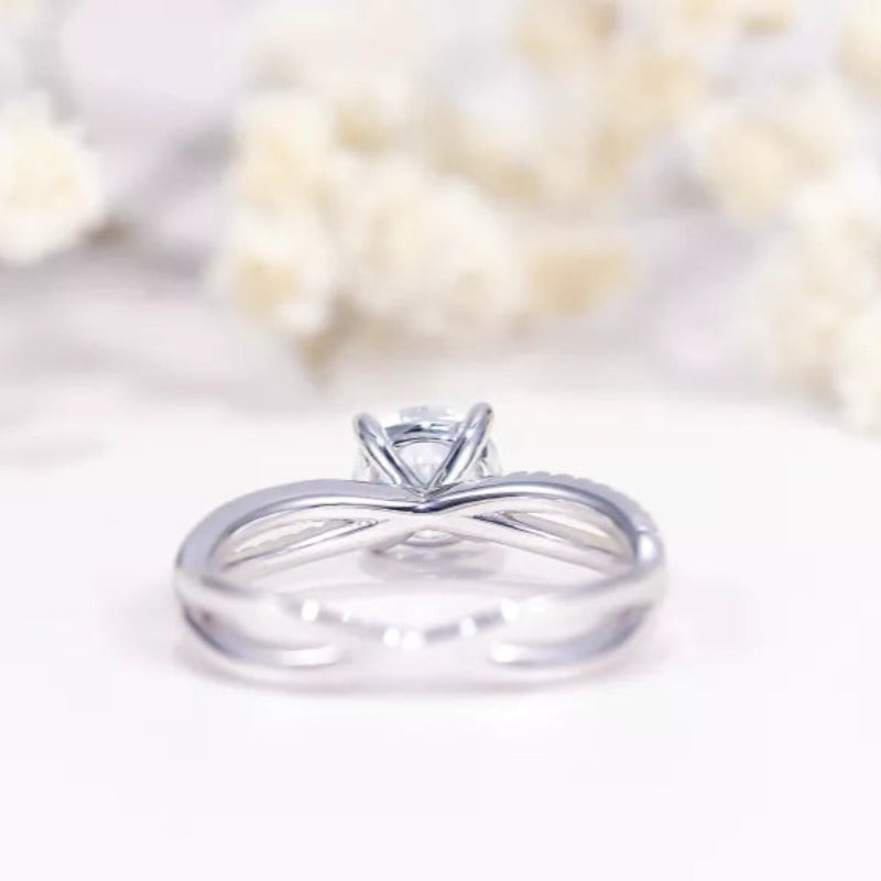 THE RICH CO - 1CT ROUND MOISSANITE STELING SILVER TWISTED RING